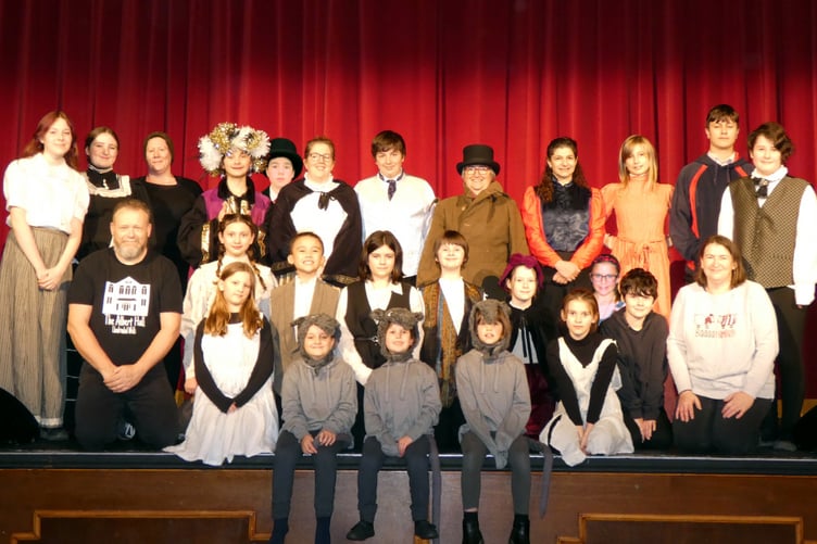 The cast and crew of Ah Players’ Scrooge at The Albert Hall.