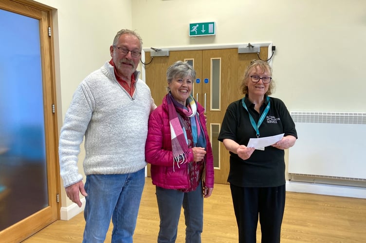 Glasnant and Linda Morgan presenting the cheque to Anna Millett.