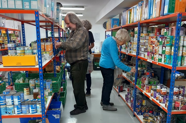 Volunteers picking food parcels at Llandrindod Foodbank