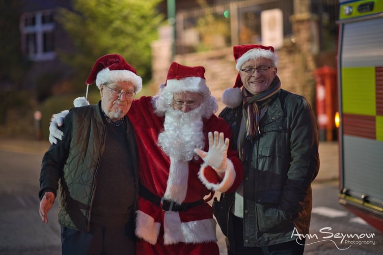 Cllrs Malcolm Dodds and William Powell with Santa Claus