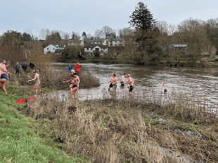 Watch as brave Boxing Day swimmers take to River Wye at Glasbury