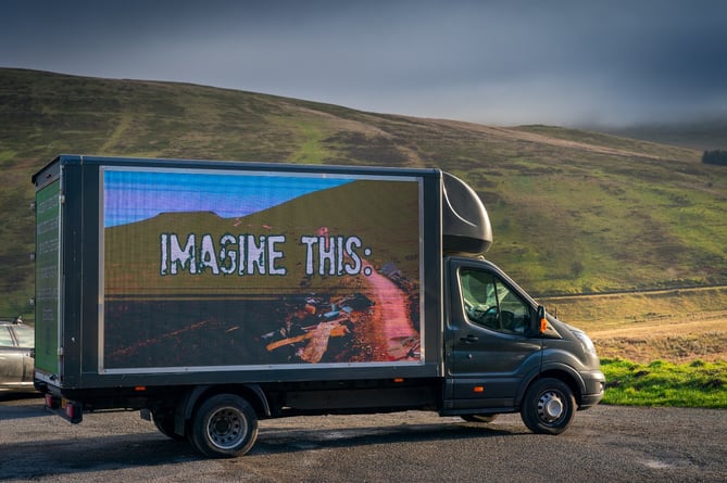 The fly-tipping Action Wales digi van at the foot of Pen y Fan