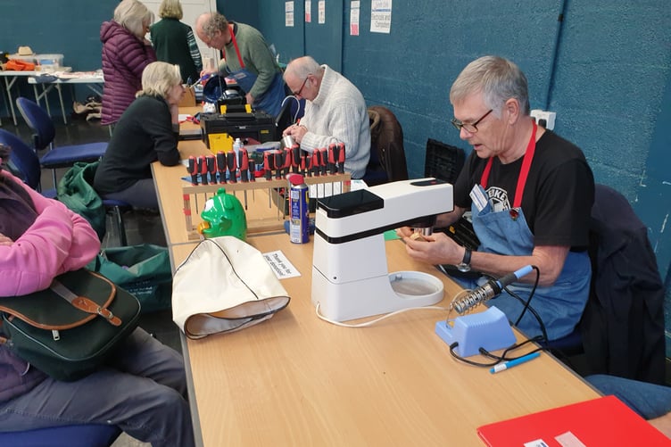 A Repair Cafe repairing session