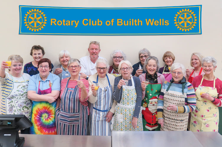 The dedicated Ladies and Chef preparing to feed the multitudes