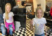 8-year-old Millie raises money for cancer charity by cutting hair