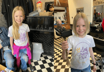 8-year-old Millie raises money for cancer charity by cutting hair