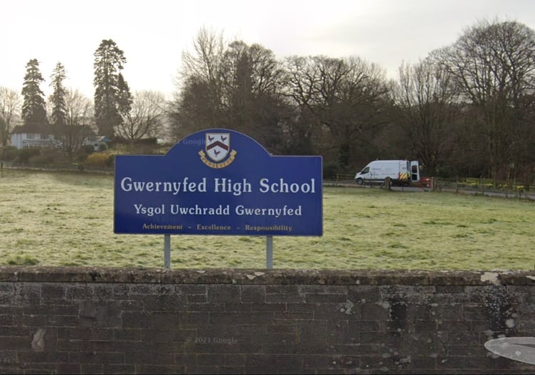No “enforcement action” will be taken against Powys County Council for an oil pollution incident at a high school, an environment watchdog has said.