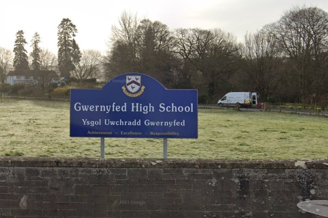 No “enforcement action” will be taken against Powys County Council for an oil pollution incident at a high school, an environment watchdog has said.