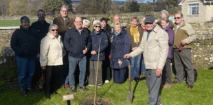 Tretower resident plants tree for the King