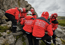 Mountain rescue team assists walker experiencing seizure
