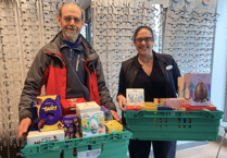 Brecon Foodbank collect Easter egg donations from Specsavers Brecon