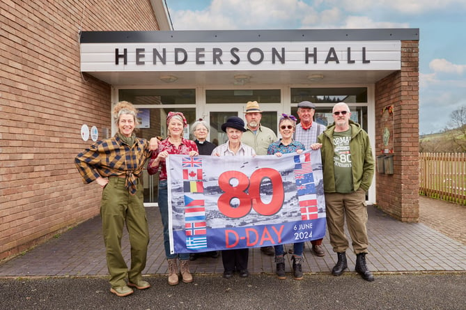 Members of the D-Day Celebrations Organising Committee in front of Henderson Hall, the venue for all celebrations on the day