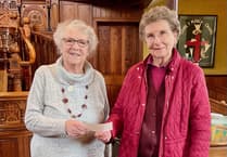 Brecon Floral Society blooms with generosity with donation