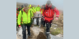 Walker suffers head injury after Beacons fall