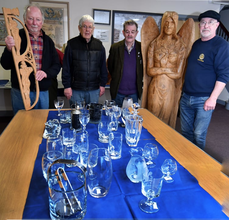 Some of the Glassware on display with co-ordinator Bryan Jones (2nd from left), and members of Builth Wells Rotary Club who helped with staging the exhibition.