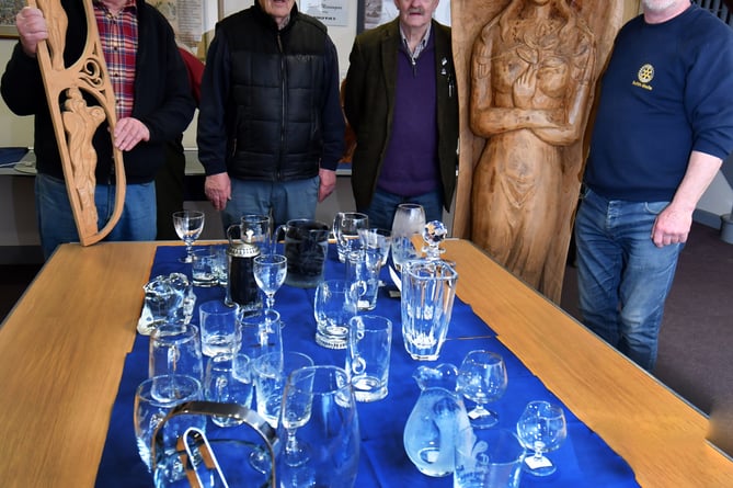 Some of the Glassware on display with co-ordinator Bryan Jones (2nd from left), and members of Builth Wells Rotary Club who helped with staging the exhibition. 