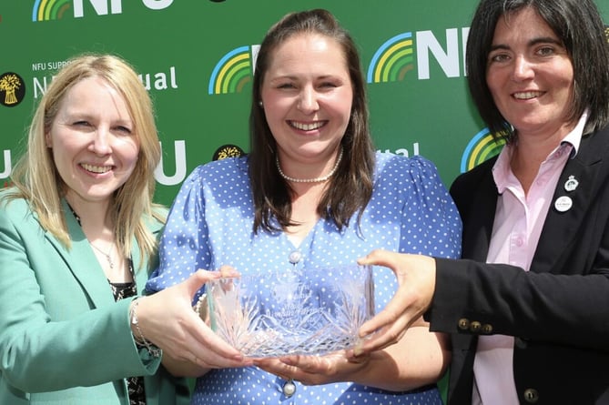 Last year's Wales Woman Farmer of the Year Katie-Rose (centre) with Lona Davies and Abi Reader 