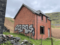 Investigation ongoing for graffiti left on Elan Valley estate building