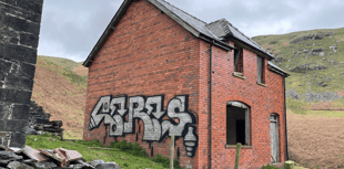 Investigation ongoing for graffiti left on Elan Valley estate building