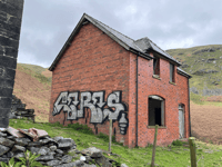 Investigation ongoing for graffiti left on Elan Valley estate building