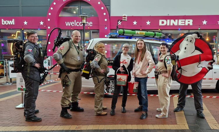 The Mid Wales Ghostbusters have raised funds for the Wales Air Ambulance