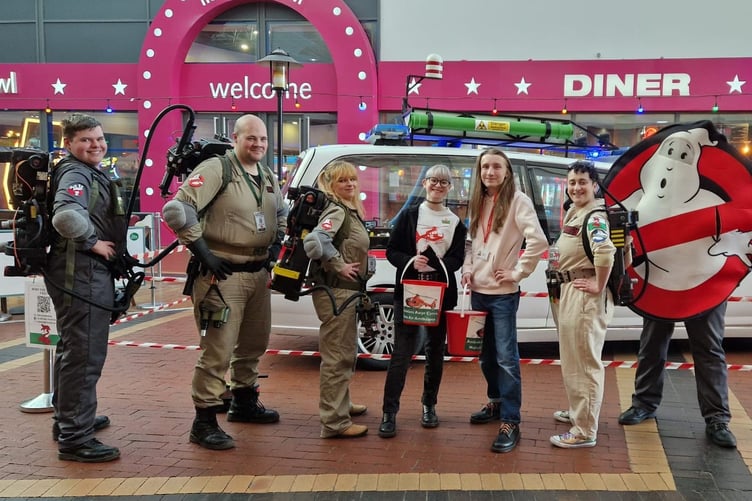 The Mid Wales Ghostbusters have raised funds for the Wales Air Ambulance