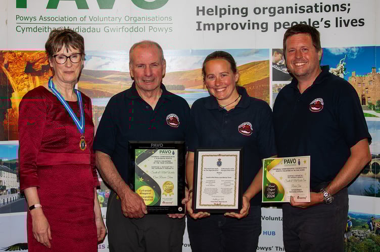High Sheriff of Powys Lady Kathryn Silk JP with South and Mid Wales Cave Rescue Team volunteers.
