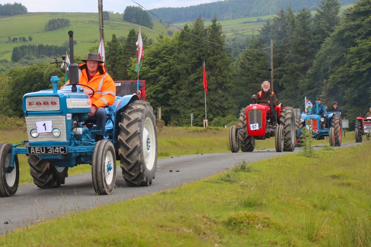 Evan Lewis leading the convoy at Tirabad