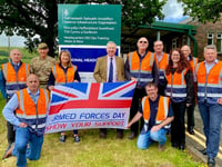 Landmarc raises the flag to mark the start of Armed Forces Week