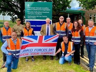 Landmarc raises the flag to mark the start of Armed Forces Week