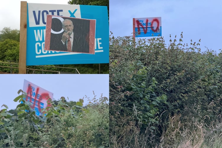 Defaced election signs