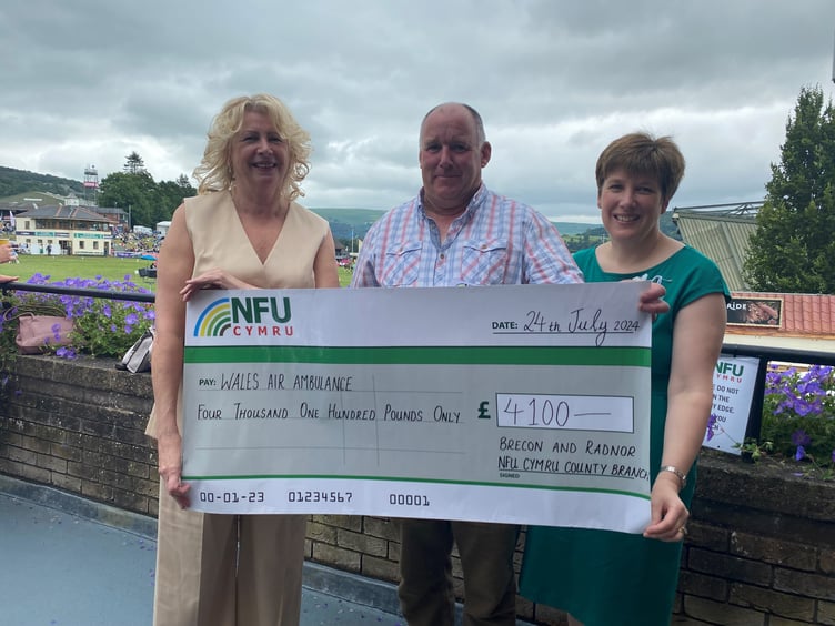 Dr Sue Barnes, Wales Air Ambulance Chief Executive, NFU Cymru Brecon & Radnor County Chairman Rob Powell and his wife, Tracy Powell