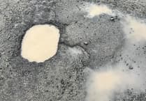 How much pothole compensation has Powys County Council paid?