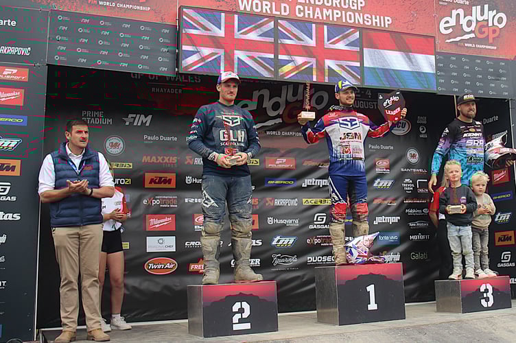 James Evans, MS for Brecon and Radnorshire, having present the trophy to Open four stroke class winner, Brit Alfie Webb