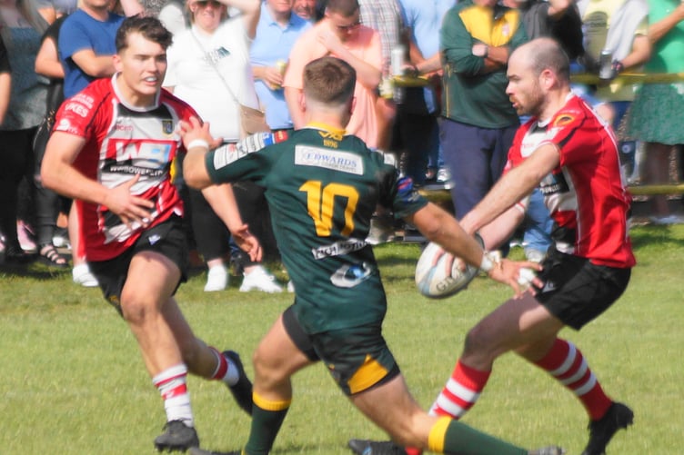 Geraint Walsh links with young centre, Huw Jones