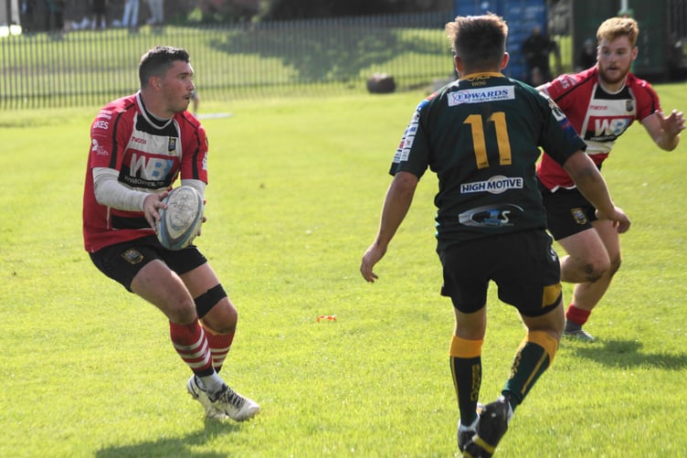 Jake Newman puts Ryan Davies away for the final try