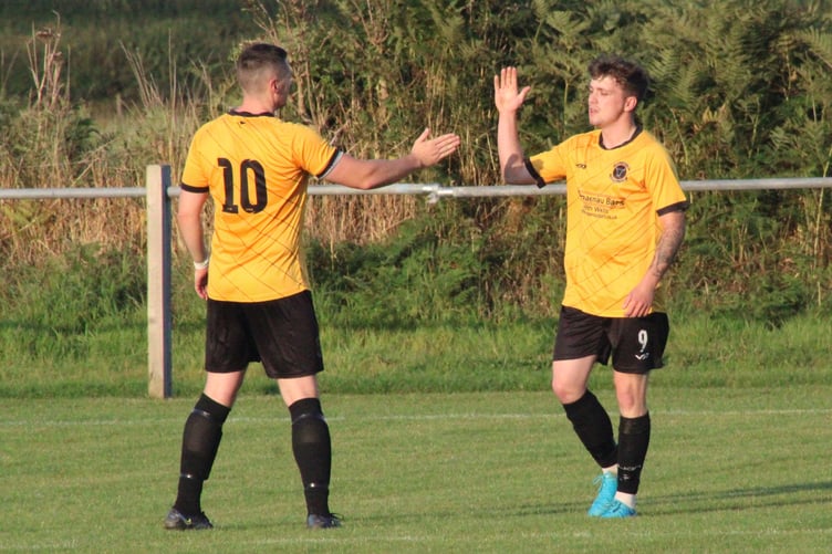 Tommy Rowlands celebrates his second goal of the match