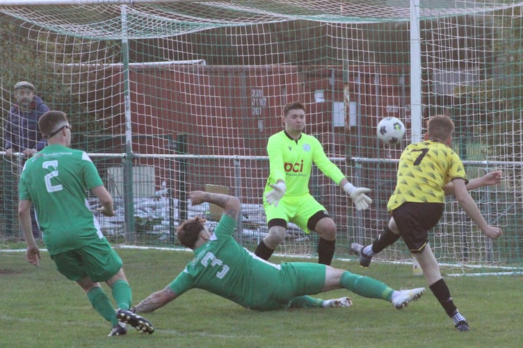 Owain Rowlands opens the scoring for the visitors