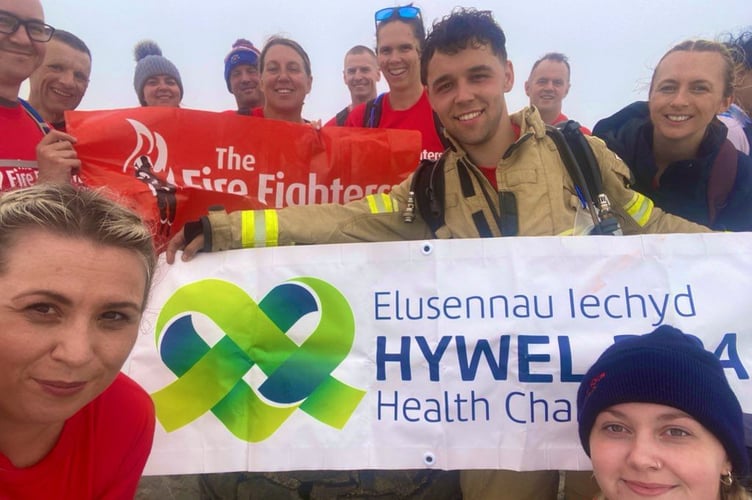 The team completed the Welsh Three Peaks Challenge for two worthy causes