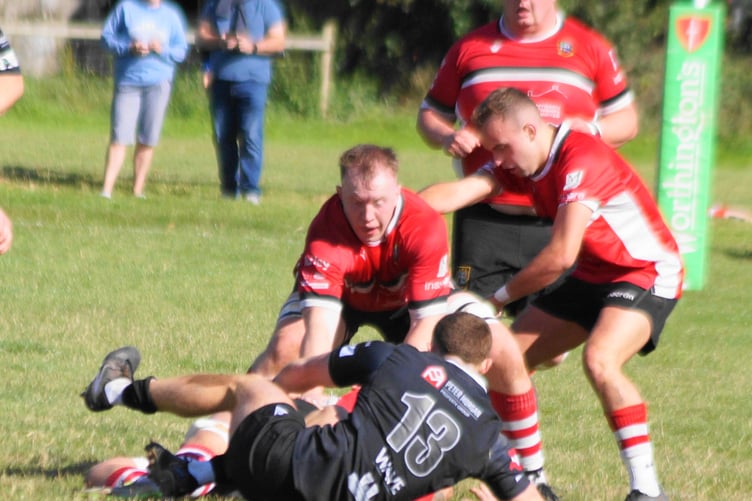 Ben Sier and Geraint Workman look to steal possession