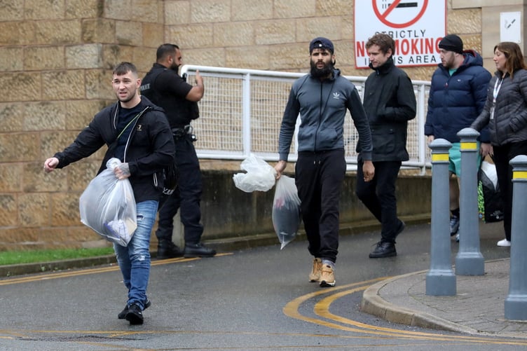 People are seen leaving HM Prison Leeds on the day an early release scheme came in to effect. September 10 2024. A number of prisoners are being released after serving 40% of their sentence due to a lack of space in prisons.