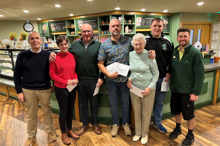 Quiz winners 'The Rascals' at the garden centre
