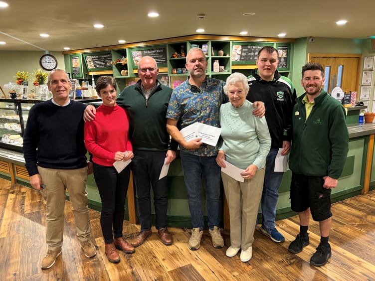 Quiz winners 'The Rascals' at the garden centre