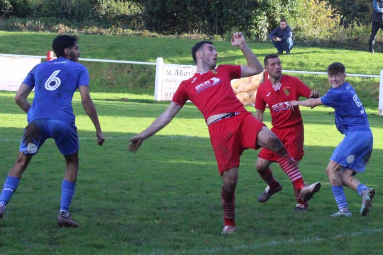 Joel Evans' late glancing header secured all three points for Brecon Corries
