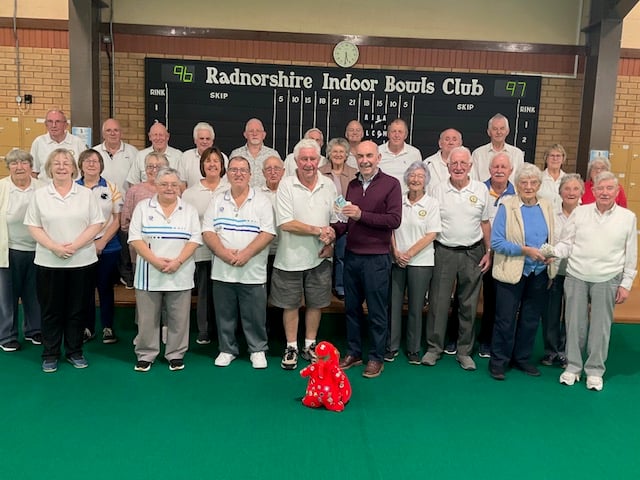 The presentation following the Tourists' victory over the indoor stadium team by one shot