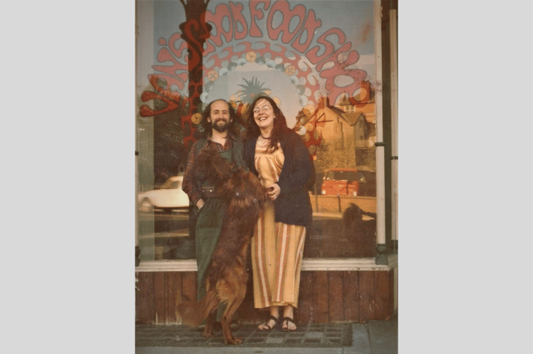 Van and Janet Powell (and Seth the dog!) in front of the Clovelly shop on High Street 