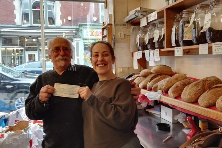 Van and Rosie, pictured on the day she took over the shop