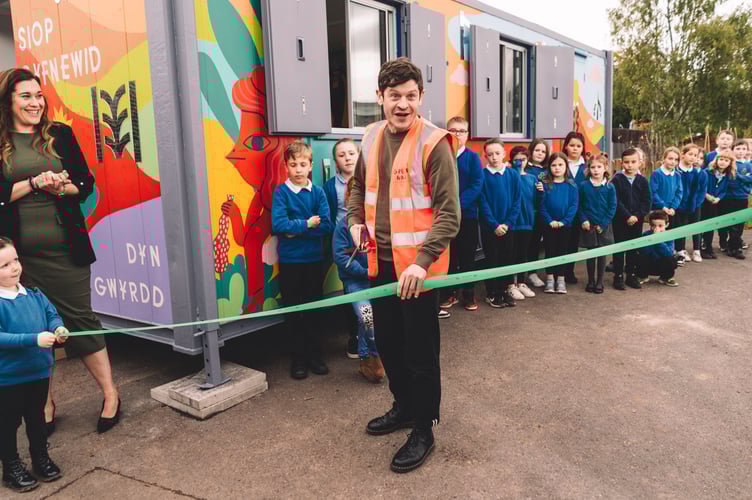 Green Man Trust Ambassador Iwan Rheon officially opening the Swap Shop at Priory Church in Wales School in Brecon.