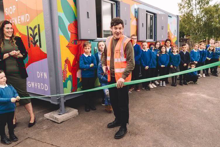 Green Man Trust Ambassador Iwan Rheon officially opening the Swap Shop at Priory Church in Wales School in Brecon.