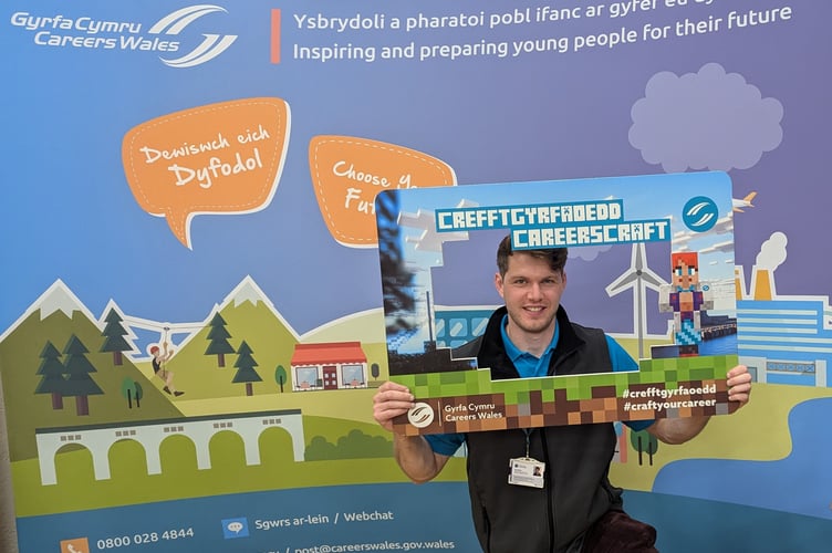 A careers adviser posing with the CareersCraft resource